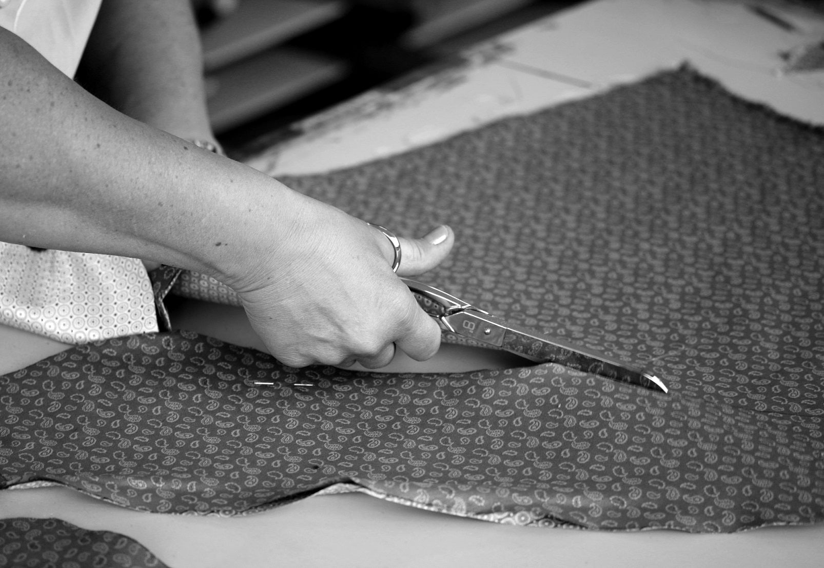 artisan cutting the silk